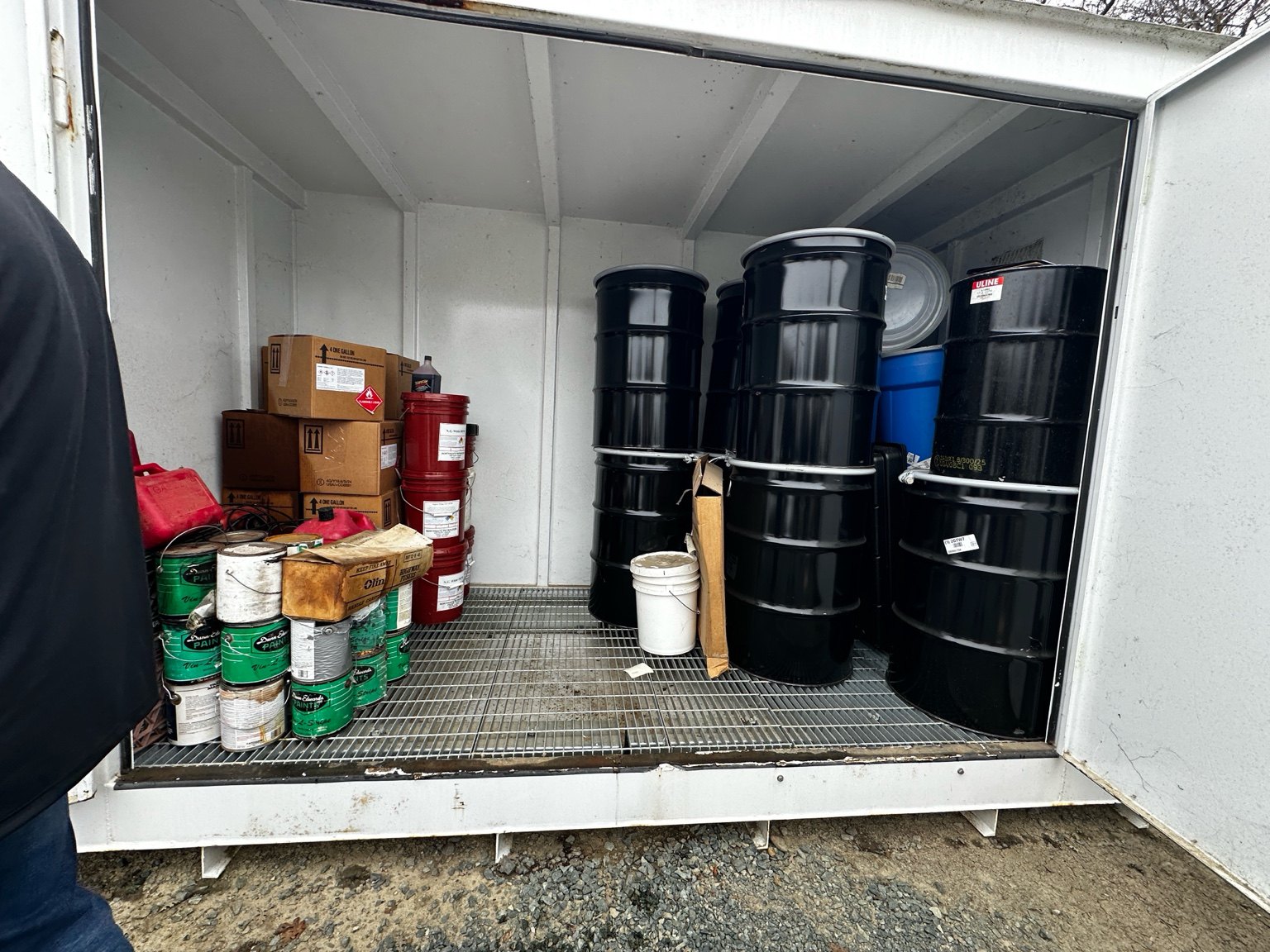 Chemical storage container at a field facility